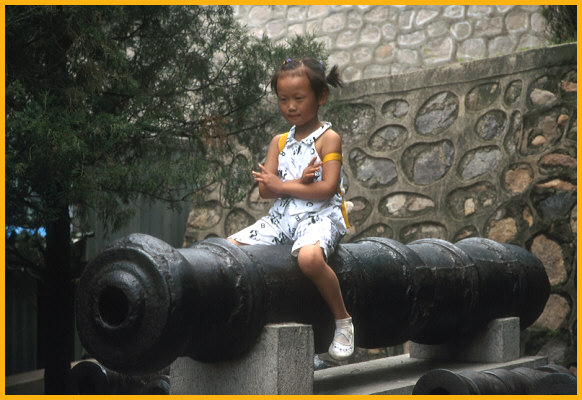 Girl Riding Cannon
