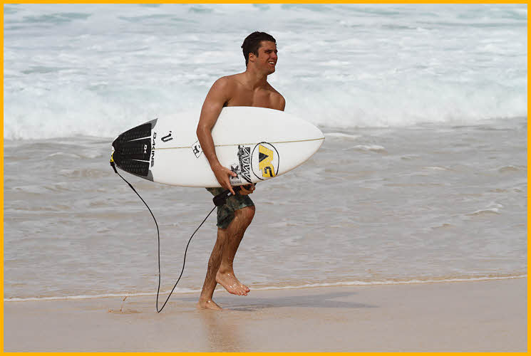 Surfer Coming Ashore