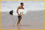 Surfer Coming Ashore